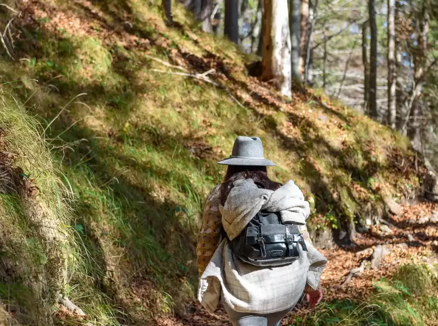 A woman hiking in the forest